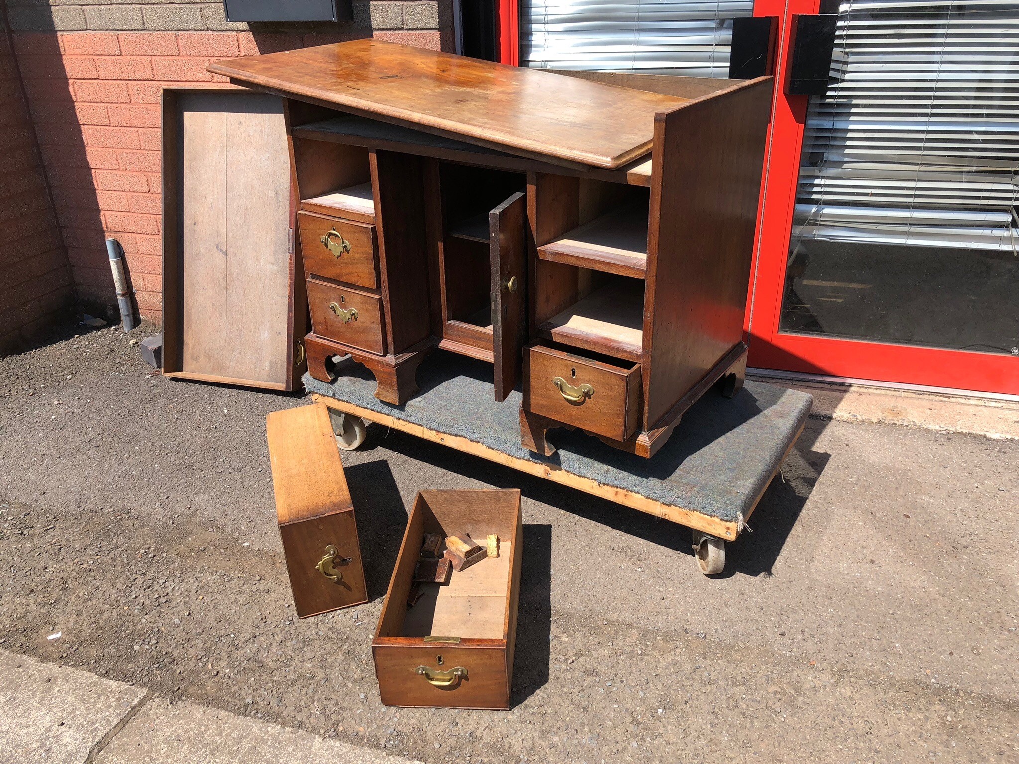 an early george iii mahogany kneehole desk