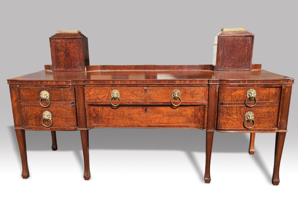 a superb regency mahogany and ebony inlaid sideboard