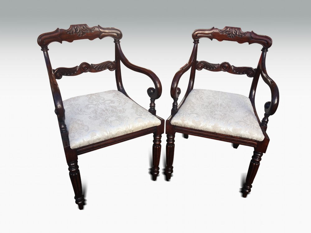 an excellent pair of regency mahogany armchairs