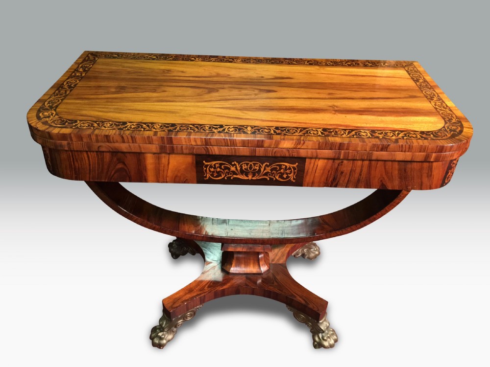 a superb regency goncalo alves holly inlaid card table in the manner of george oakley
