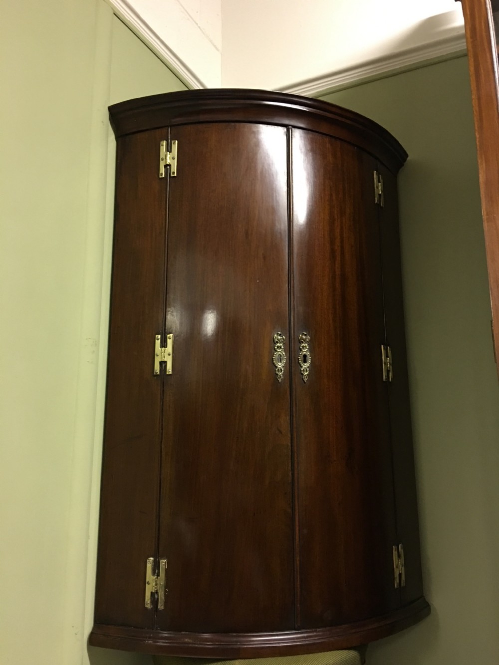 a fine george iii mahogany bowfront corner cupboard