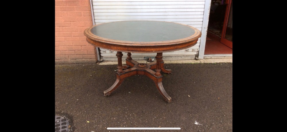 a mid 19th c oak ebony inlaid library table