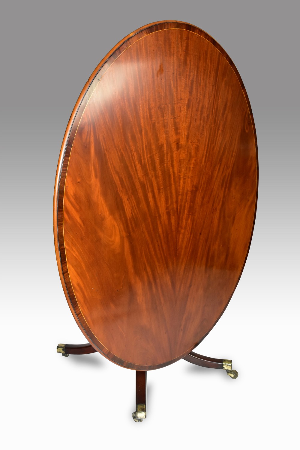 a fine george iii mahogany oval tilt top breakfast table