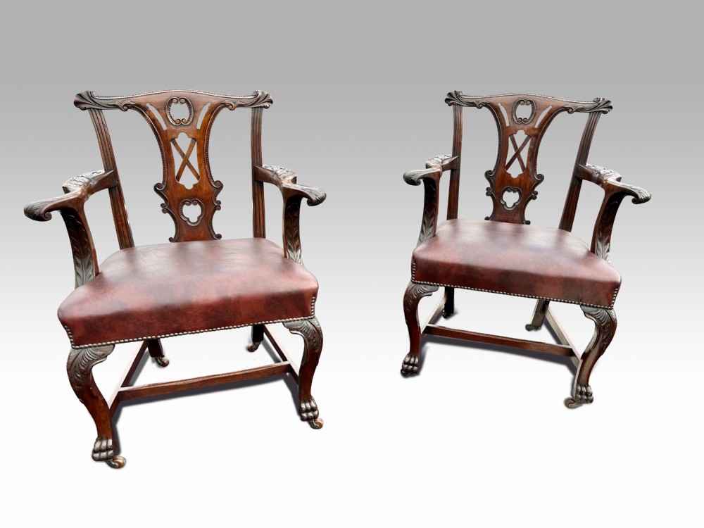 superb pair of irish mahogany armchairs