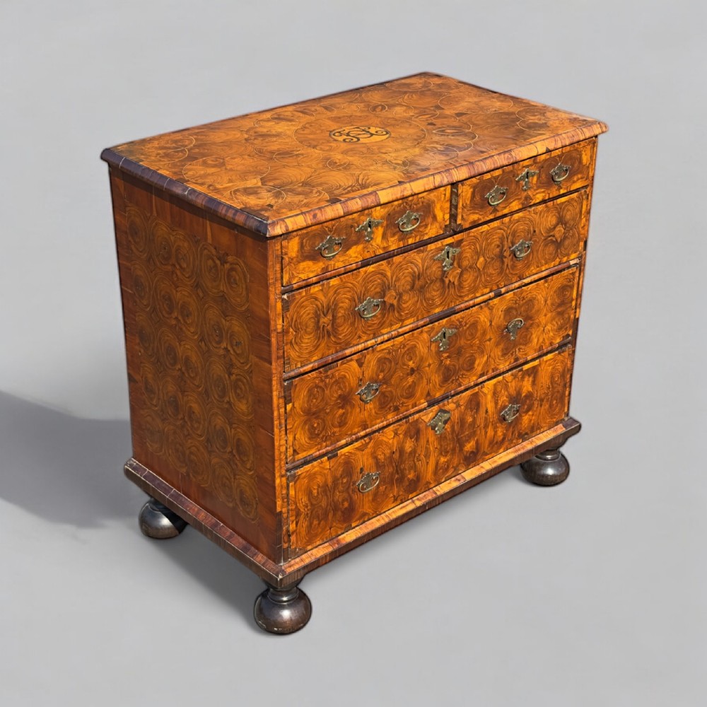 a rare charles ii laburnum olivewood oyster veneered chest of drawers
