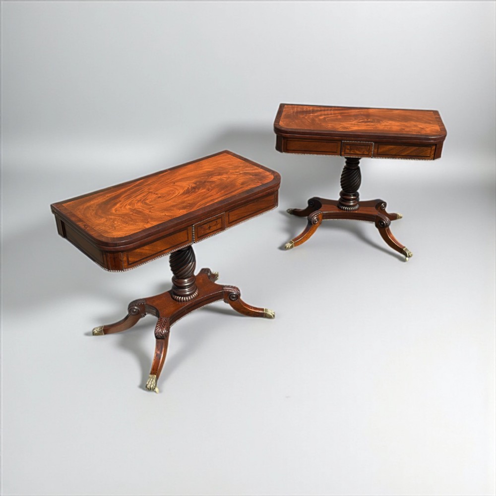 a fine pair of irish regency mahogany rosewood inlaid card tables